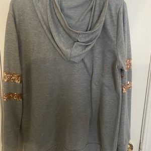 Hoodie with rose gold sequins